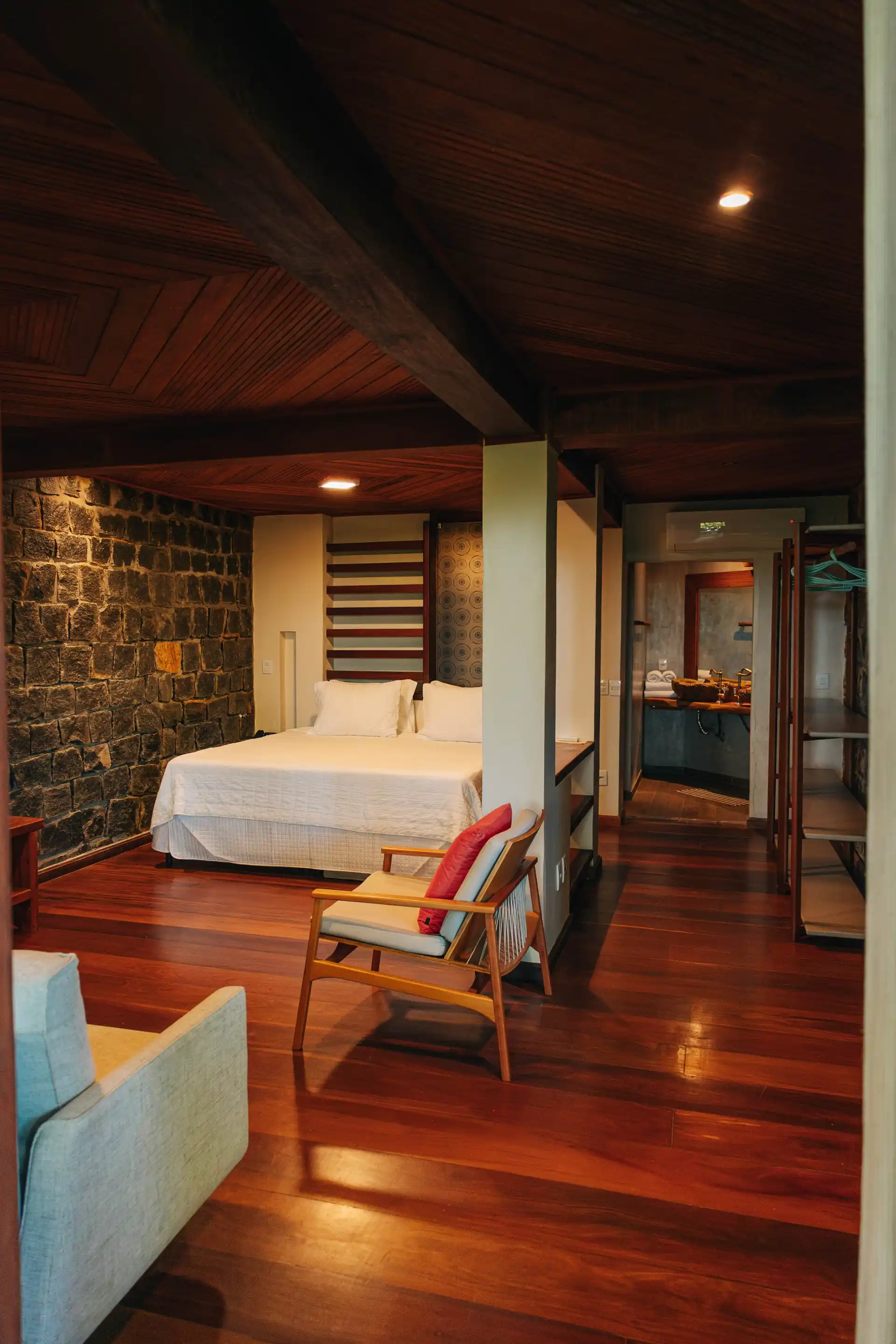 A Tulha suite with the exposed stone wall